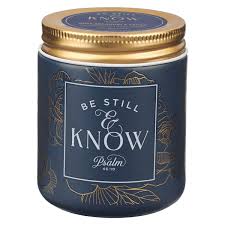 Be Still and Know Golden Rose Nordic Seaside Scented Candle in a Blue