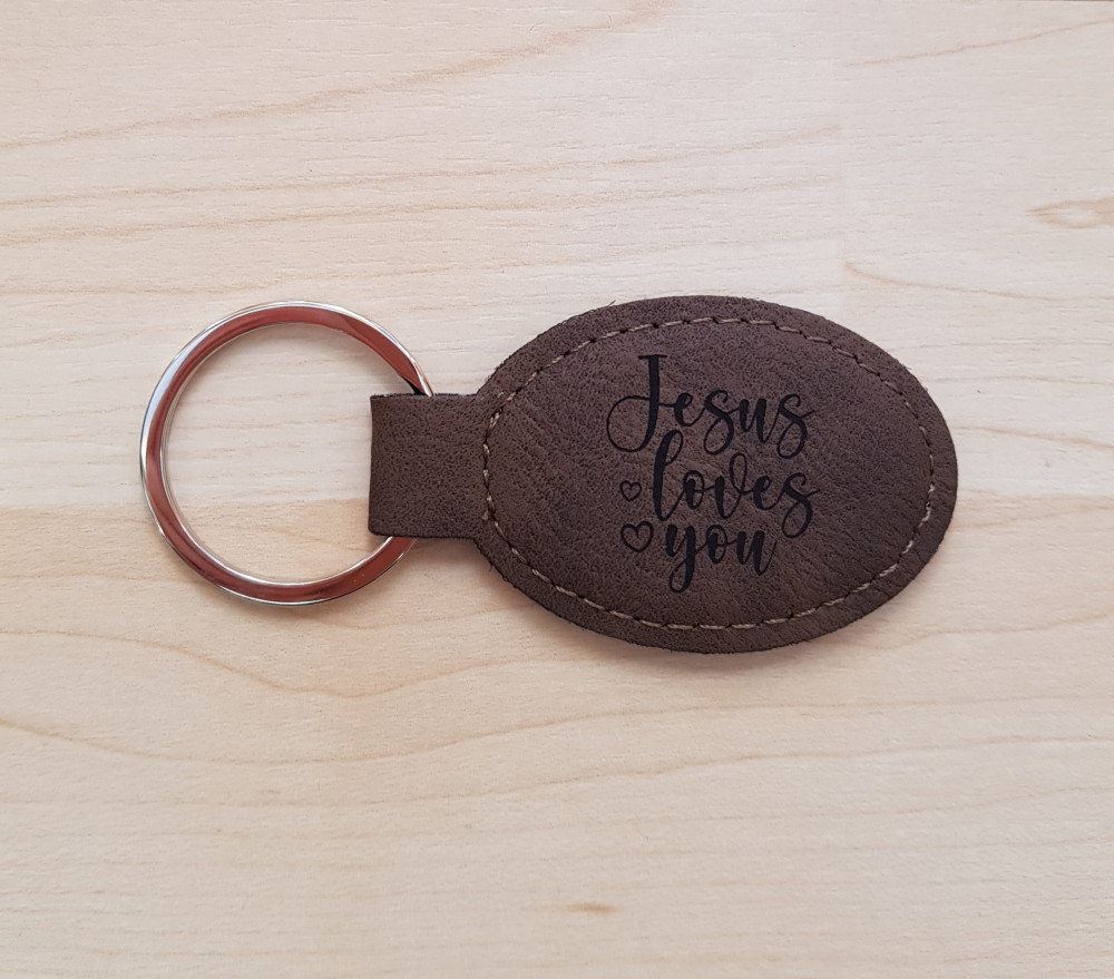 Schlüsselanhänger, "Jesus loves you" - dunkelbraun, Kunstleder, mit graviertem Schriftzug
