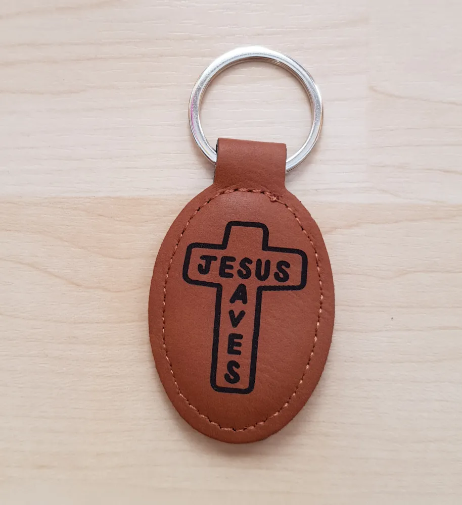 Schlüsselanhänger, "Jesus Saves" - bronze, Kunstleder, mit Kreuz-Gravur