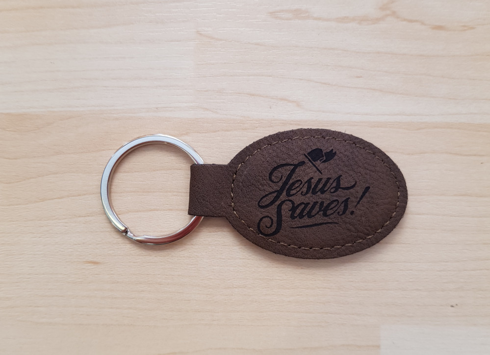 Schlüsselanhänger, "Jesus Saves" - dunkelbraun, Kunstleder, mit gaviertem Schriftzug