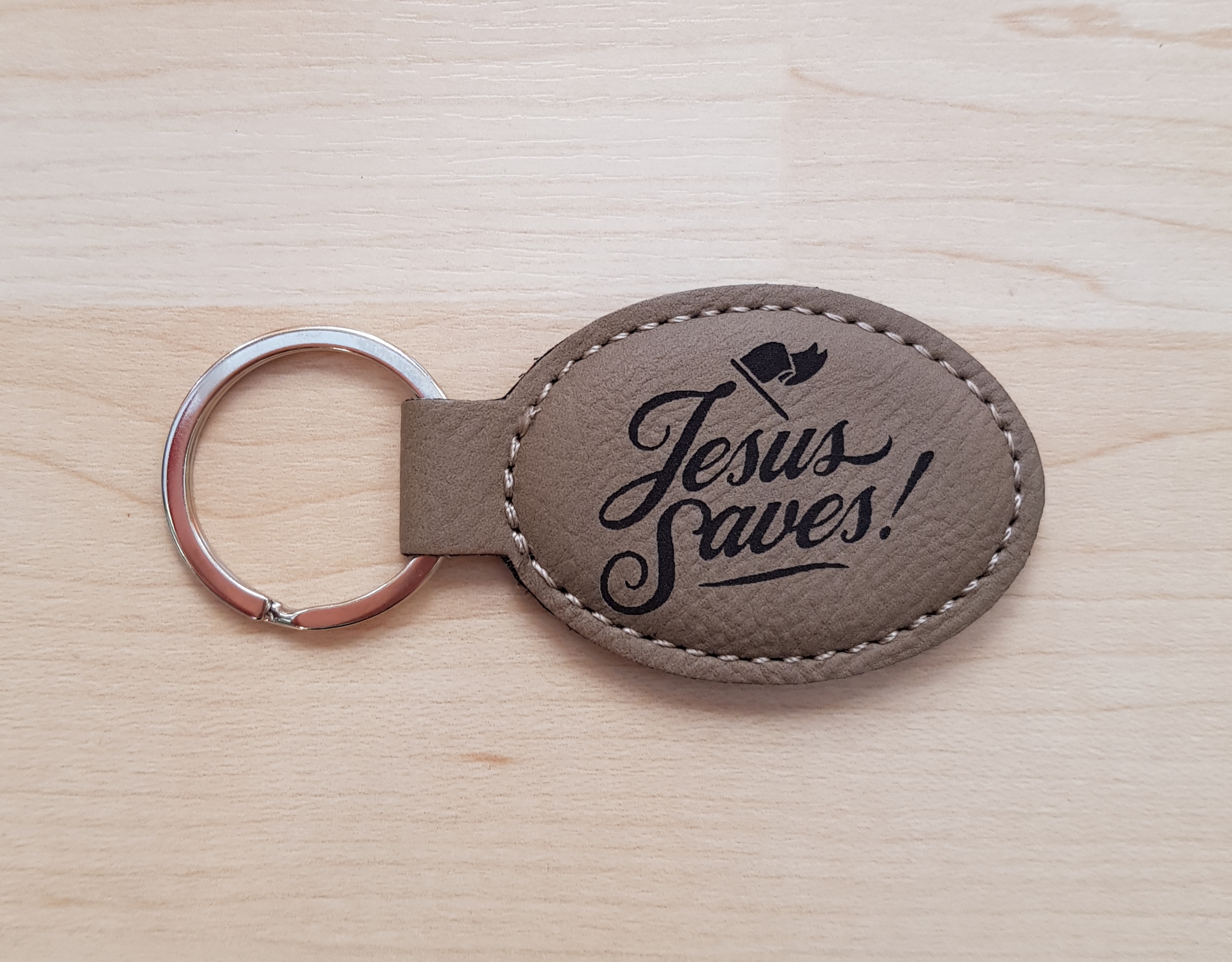 Schlüsselanhänger, "Jesus Saves" - beige, Kunstleder, mit graviertem Schriftzug